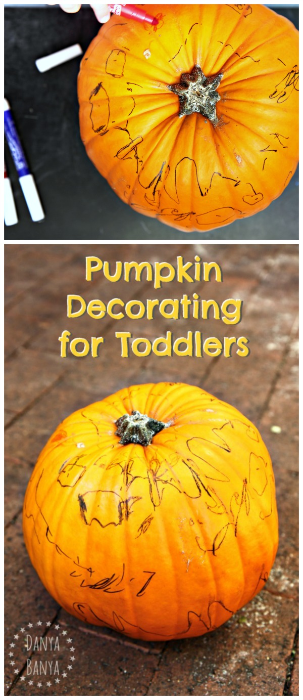 Toddler pumpkin decorating for Halloween
