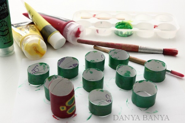 Painting toilet paper rolls for The Very Hungry Caterpillar craft