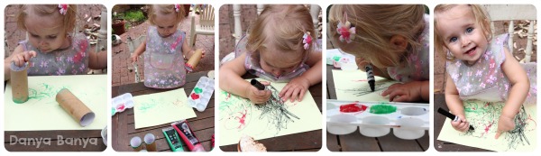 Toddler art using toilet paper roll stampers and marker