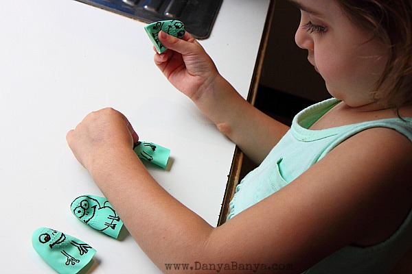 JJ playing with the five speckled frog rubber glove finger puppets