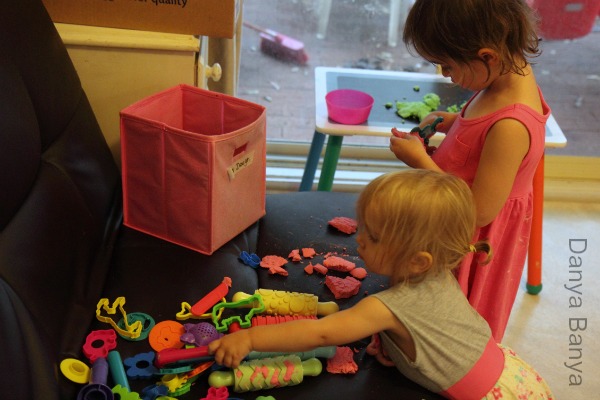 Toddler and Preschooler playing with apple scented play dough