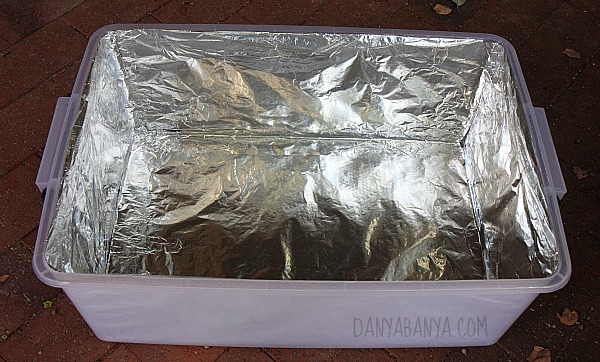 Use aluminium foil to line a storage tub to reflect the light