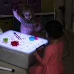 Playing with water beads on the light table