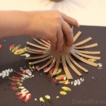 Fireworks painting using DIY toilet paper roll stampers