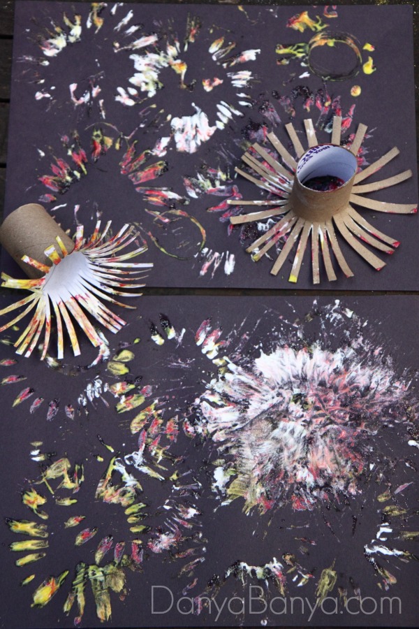 Fireworks paintings using DIY toilet paper roll stampers