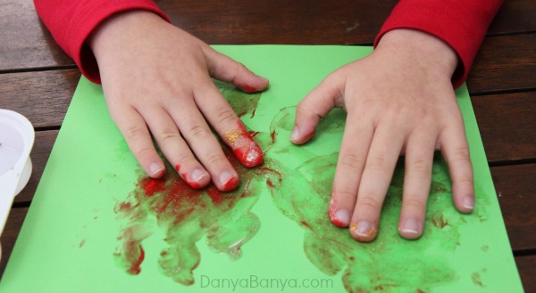 Glorious glittery sensory finger painting