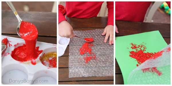 Spooning paint and making prints with bubble wrap