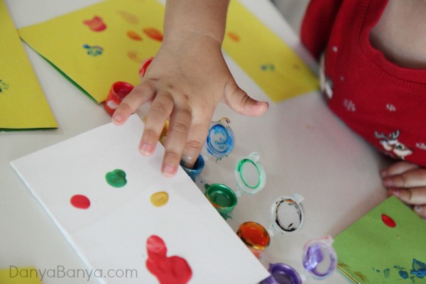 Tiny paint pots are perfect for making fingerprint paintings