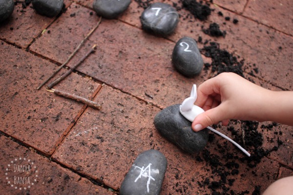 Playing hickory dickory dock with a rock clock and mouse