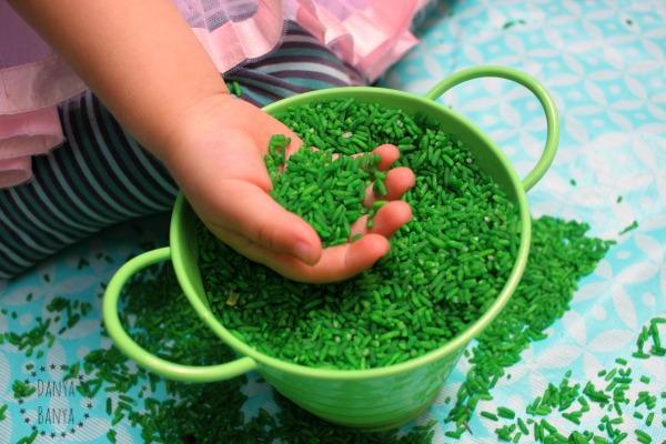 Sensory play with coloured rice
