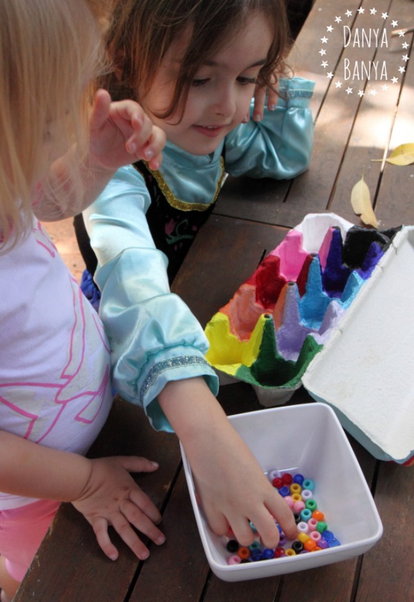 Sorting pony beads by colour