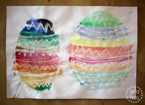 Water colour easter egg paintings using crayon resist technique