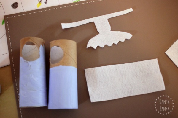 Cutting a felt apron and bonnet for Little Bo Peep