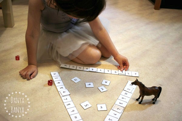 Playful maths fun dice game to help kids learn early maths skills