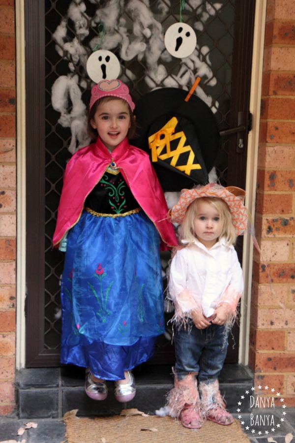 Upcycled CD ghosts as Halloween decorations.