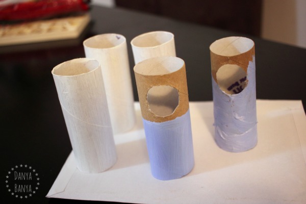 Waiting for painted toilet paper rolls to dry
