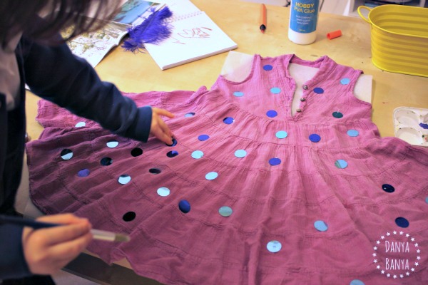 Gluing 100 sequins for the 100th day of school