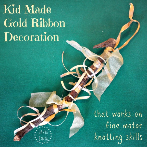 Kid-Made Gold Ribbon Decoration that works on fine motor knotting skills