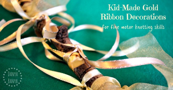 Kid-Made Gold Ribbon Decorations for fine motor knotting skills