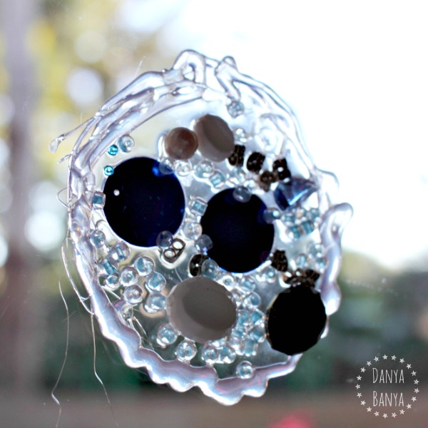 Kid-made sequin and bead suncatcher window cling