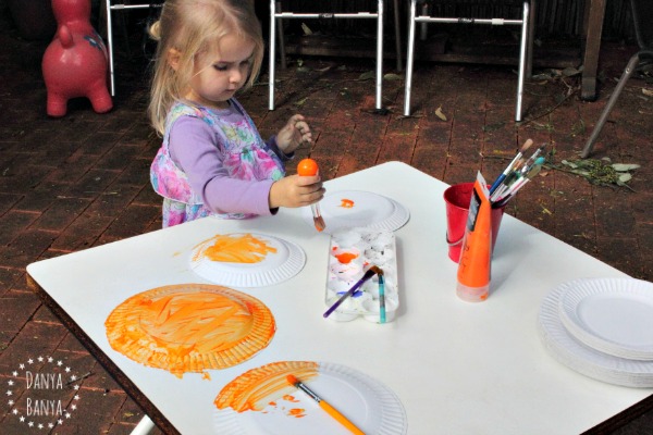 Painting paper plates orange