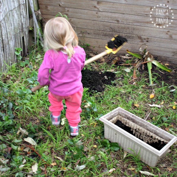 Digging and heavy garden play for toddlers