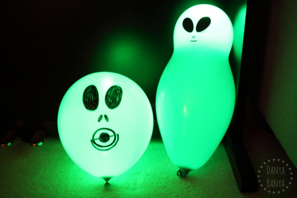 Glowing alien and baby balloons