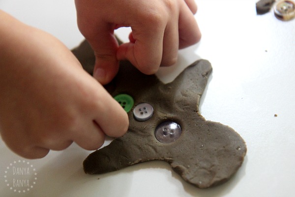 Gingerbread play dough, cookie cutter and buttons for Christmas sensory play