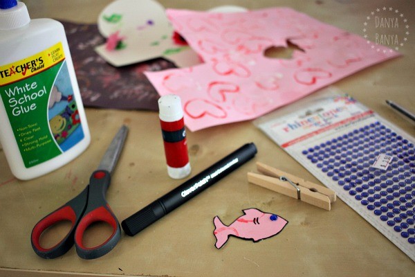 Making nibbling fish pegs using kids artwork