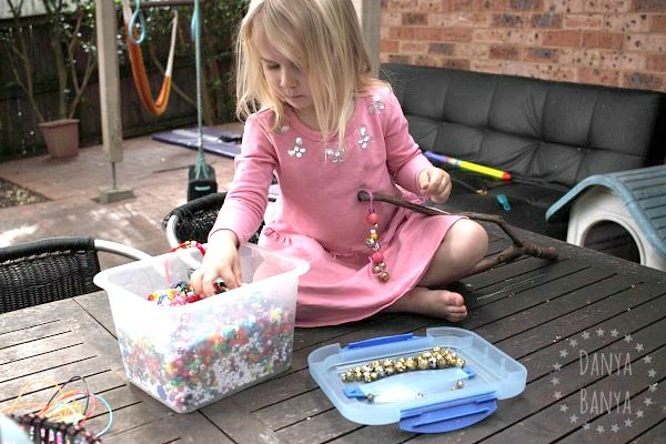 Adding beads to the jingle stick