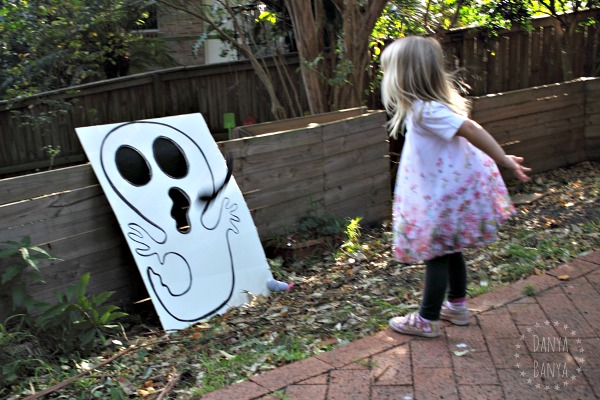 DIY ghost and skull boards for cornhole / bean-bag toss game for Halloween or a Spooky Party