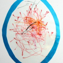 Preschooler Easter egg window art drawing with textas on sticky contact paper